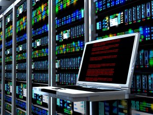 3D rendering of the interior of a data center, with a laptop screen in the foreground. Image by Ralwel/iStockphoto.com